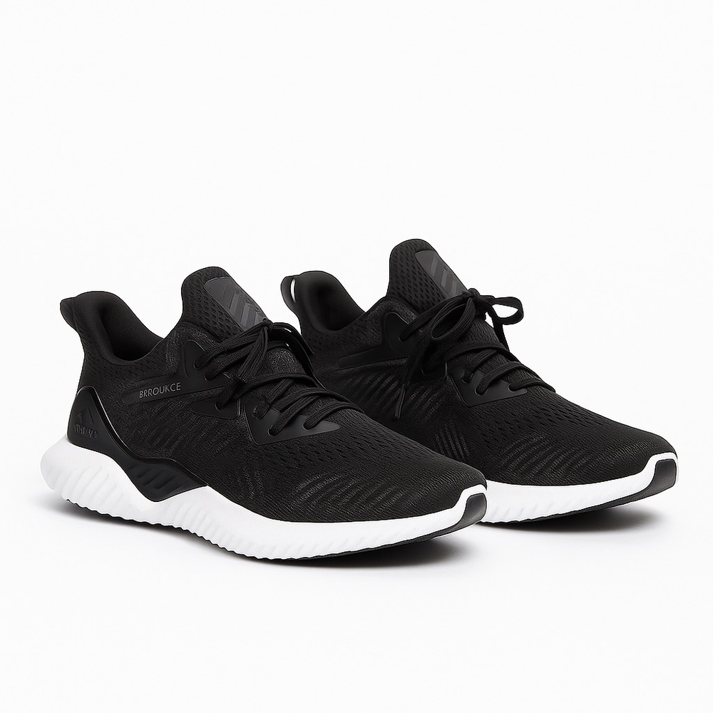 Adidas Black and White Athletic Shoes with Mesh Upper and Cushioned Sole